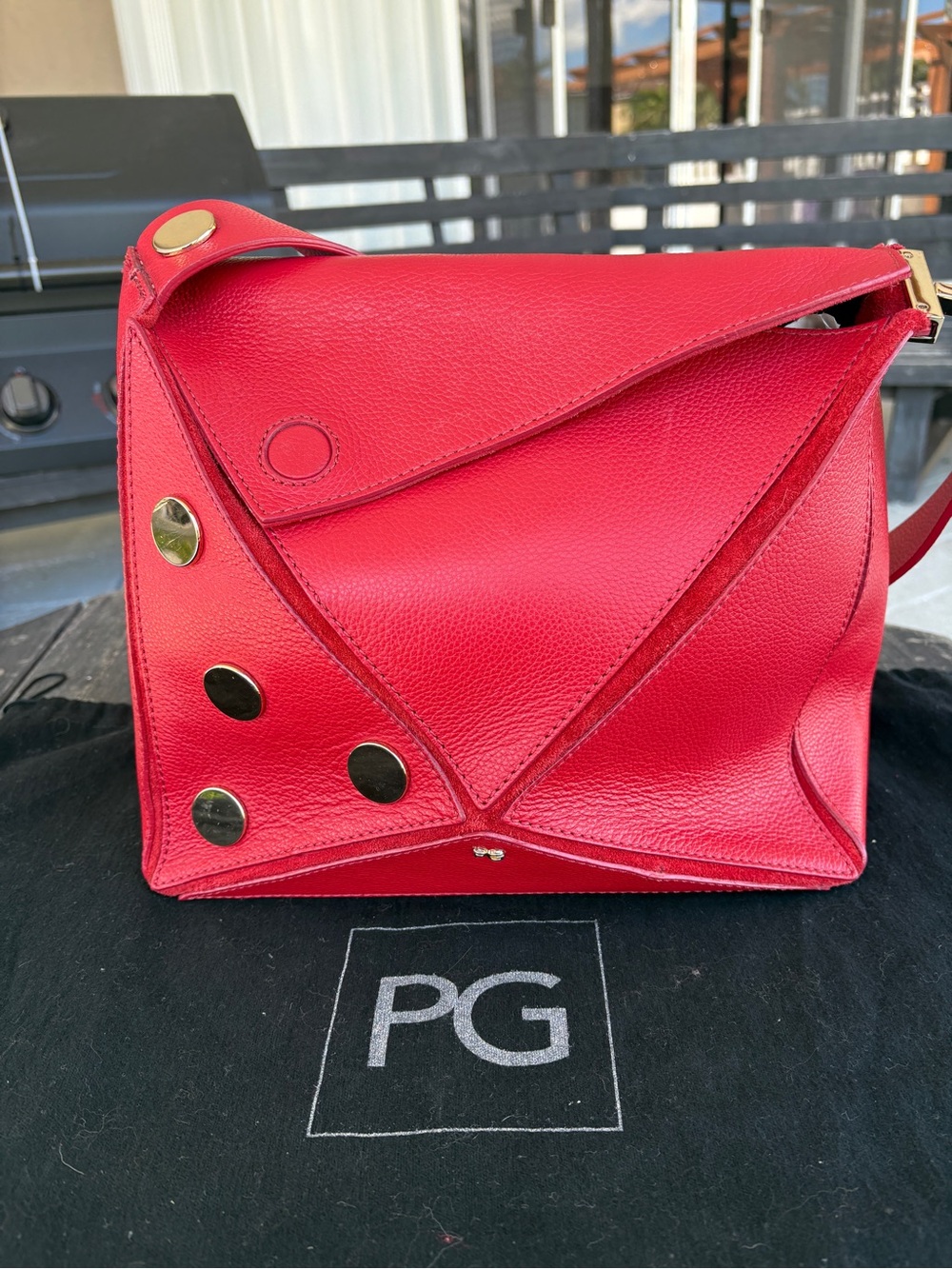 PURIFICACION GARCIA red Leather handbag. Medium Size. Used once.